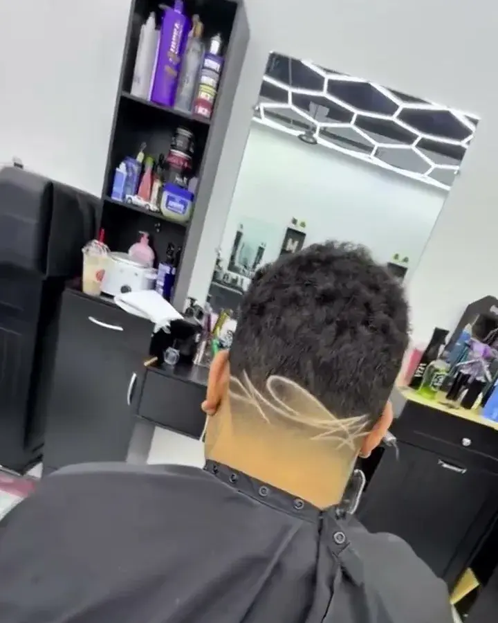 Curly top with a designed nape, cut at EverCutz