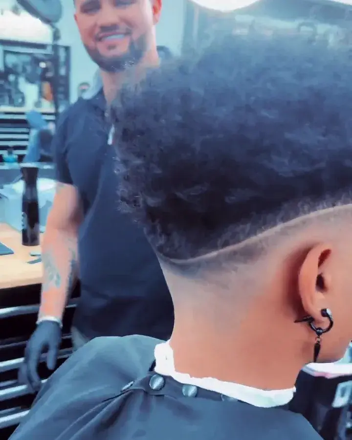 Fade with a shaved line on textured hair, cut at EverCutz